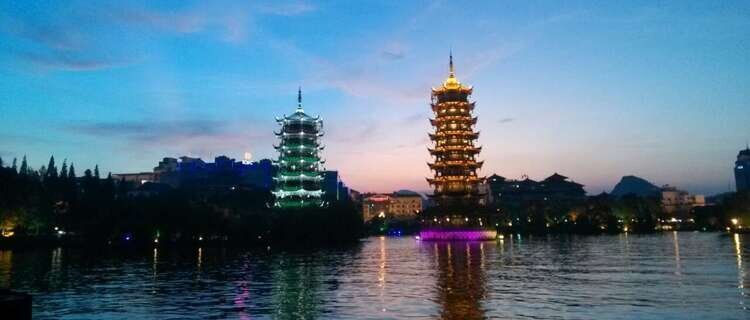 Moon and Sun Twin Towers' Night View