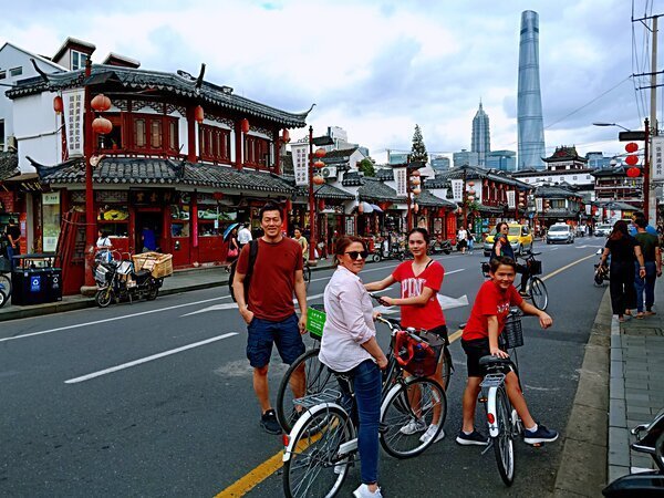 Cycling around the Old Street in Shanghai