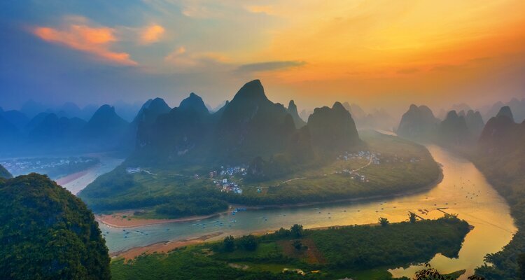 Sunrise over the Li River karst mountains near Xingping