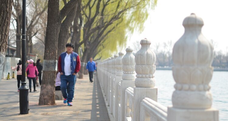 People on the streets of Beijing in spring